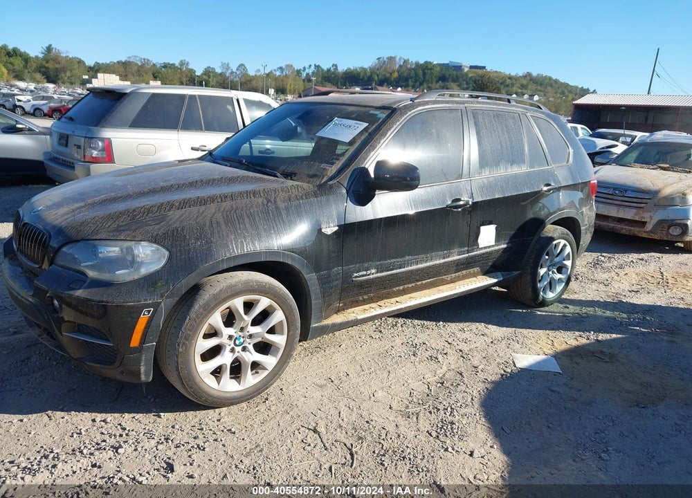 2012 BMW X5 XDRIVE35I/XDRIVE35I PREMIUM/XDRIVE35I SPORT ACTIVITY VIN: 5UXZV4C55CL992208