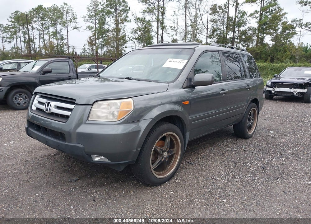 2007 HONDA PILOT EX-L VIN: 5FNYF28727B003010