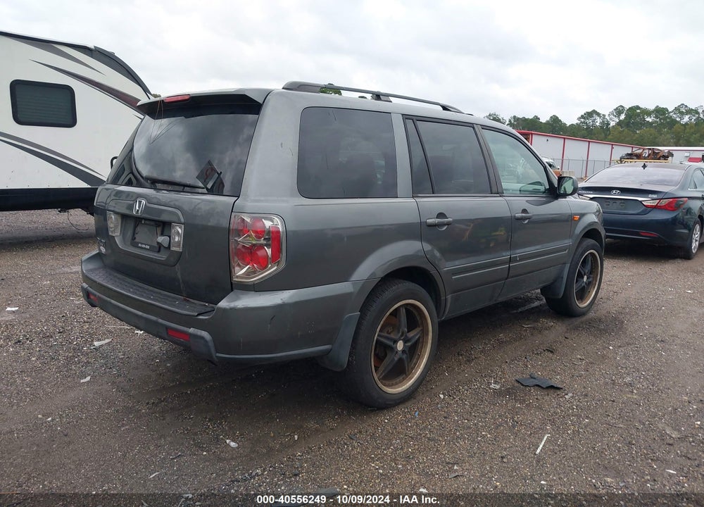 2007 HONDA PILOT EX-L VIN: 5FNYF28727B003010