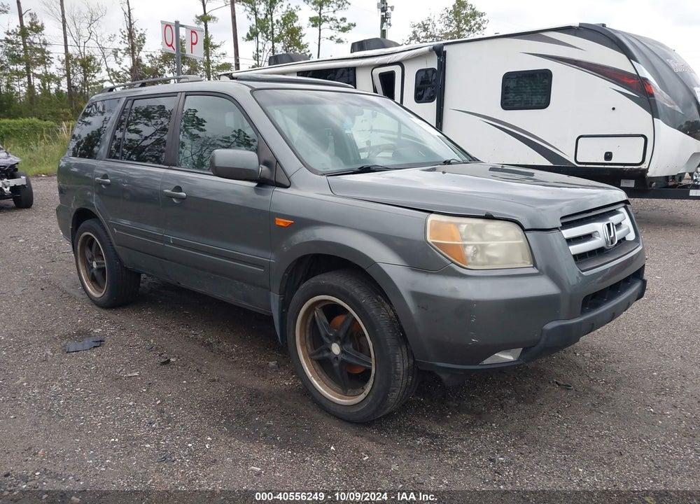 2007 HONDA PILOT EX-L VIN: 5FNYF28727B003010