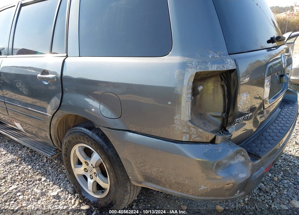 2007 HONDA PILOT EX-L VIN: 5FNYF18777B011517
