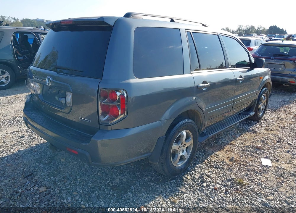 2007 HONDA PILOT EX-L VIN: 5FNYF18777B011517