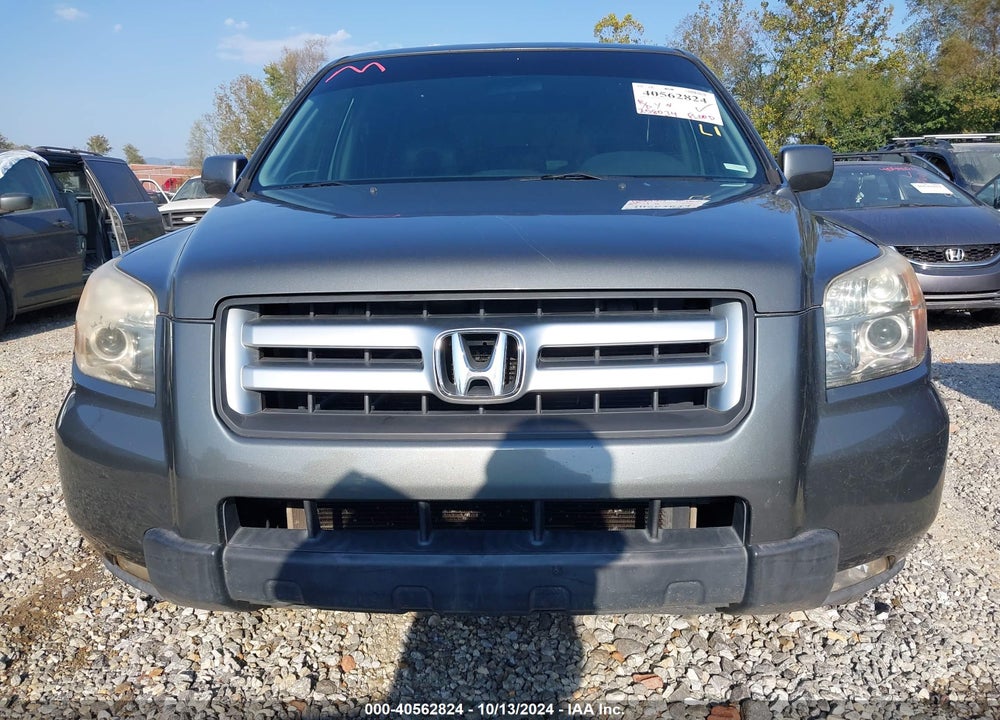 2007 HONDA PILOT EX-L VIN: 5FNYF18777B011517