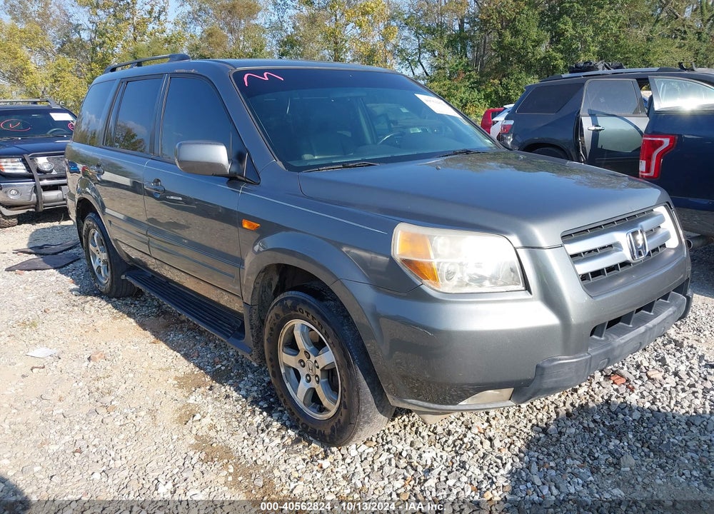 2007 HONDA PILOT EX-L VIN: 5FNYF18777B011517