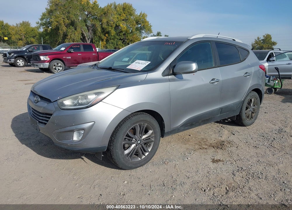 2014 HYUNDAI TUCSON SE VIN: KM8JUCAG4EU882629