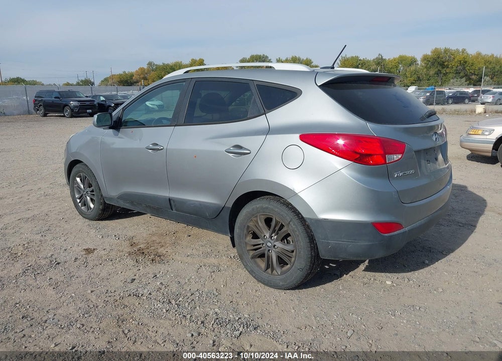 2014 HYUNDAI TUCSON SE VIN: KM8JUCAG4EU882629