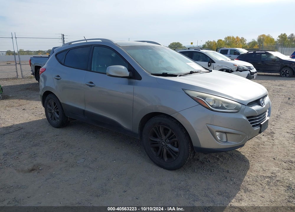 2014 HYUNDAI TUCSON SE VIN: KM8JUCAG4EU882629