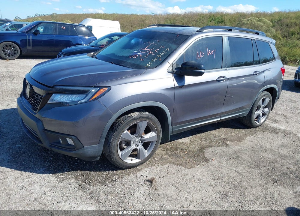 2021 HONDA PASSPORT 2WD TOURING VIN: 5FNYF7H98MB010764