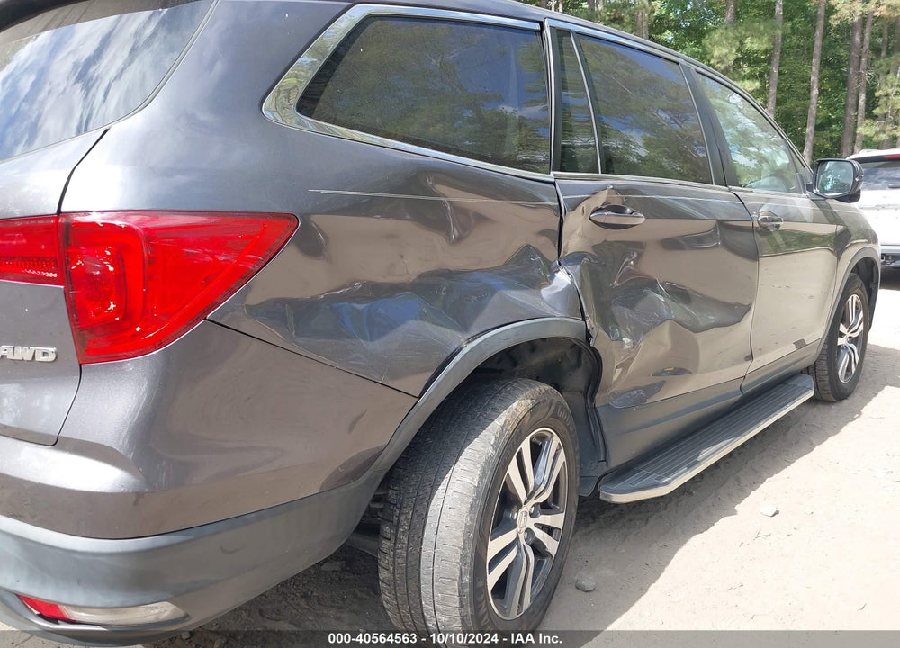 2018 HONDA PILOT EX-L VIN: 5FNYF6H50JB031739