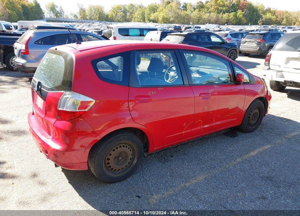 2012 HONDA FIT VIN: JHMGE8H38CC022892
