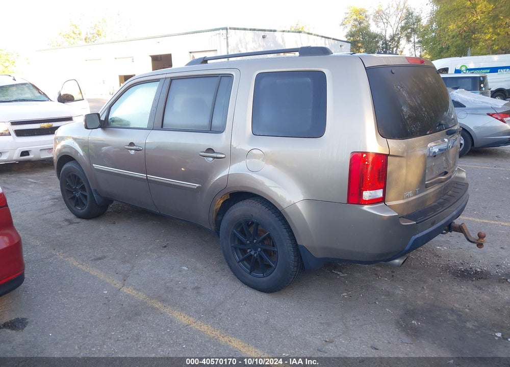 2011 HONDA PILOT EX-L VIN: 5FNYF4H54BB002573