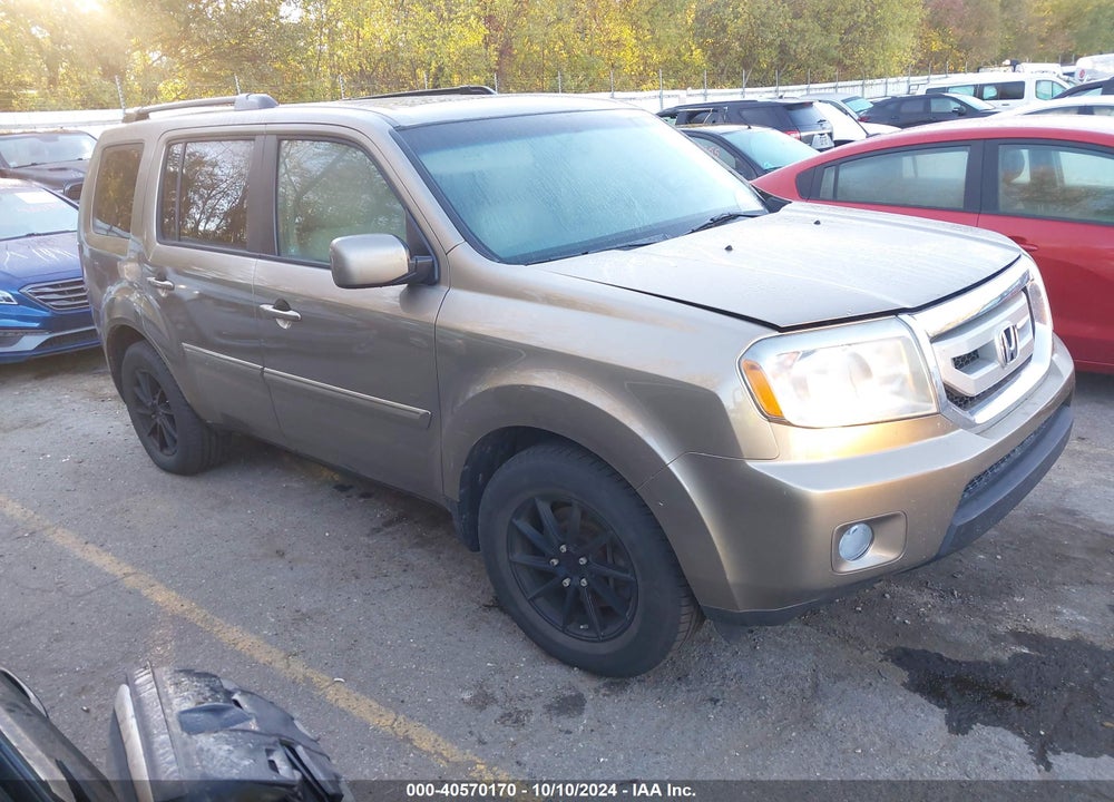 2011 HONDA PILOT EX-L VIN: 5FNYF4H54BB002573