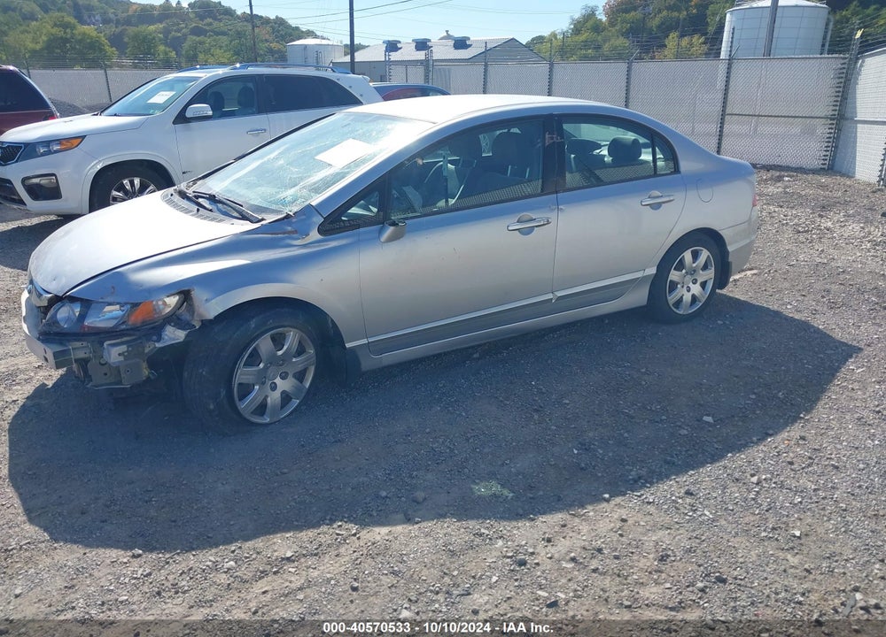 2010 HONDA CIVIC LX VIN: 2HGFA1F57AH575100