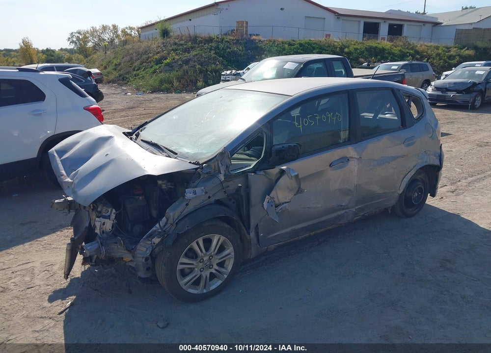 2009 HONDA FIT SPORT VIN: JHMGE884X9C005917