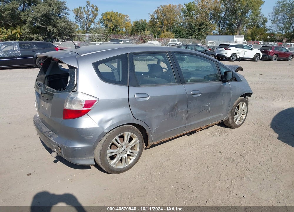 2009 HONDA FIT SPORT VIN: JHMGE884X9C005917