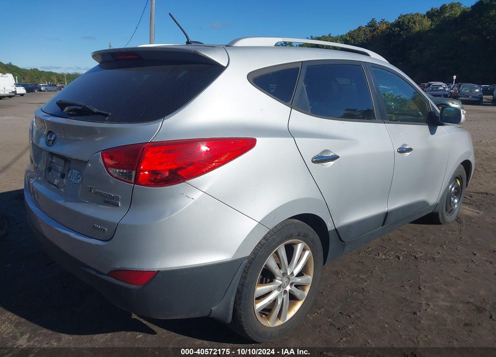 2013 HYUNDAI TUCSON LIMITED VIN: KM8JUCAC7DU560272