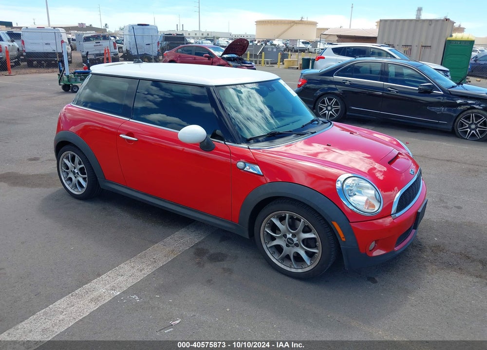 2009 MINI COOPER S VIN: WMWMF73559TT94667