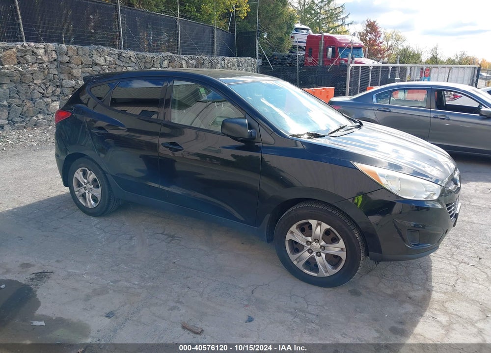 2013 HYUNDAI TUCSON GL VIN: KM8JT3AB9DU659136
