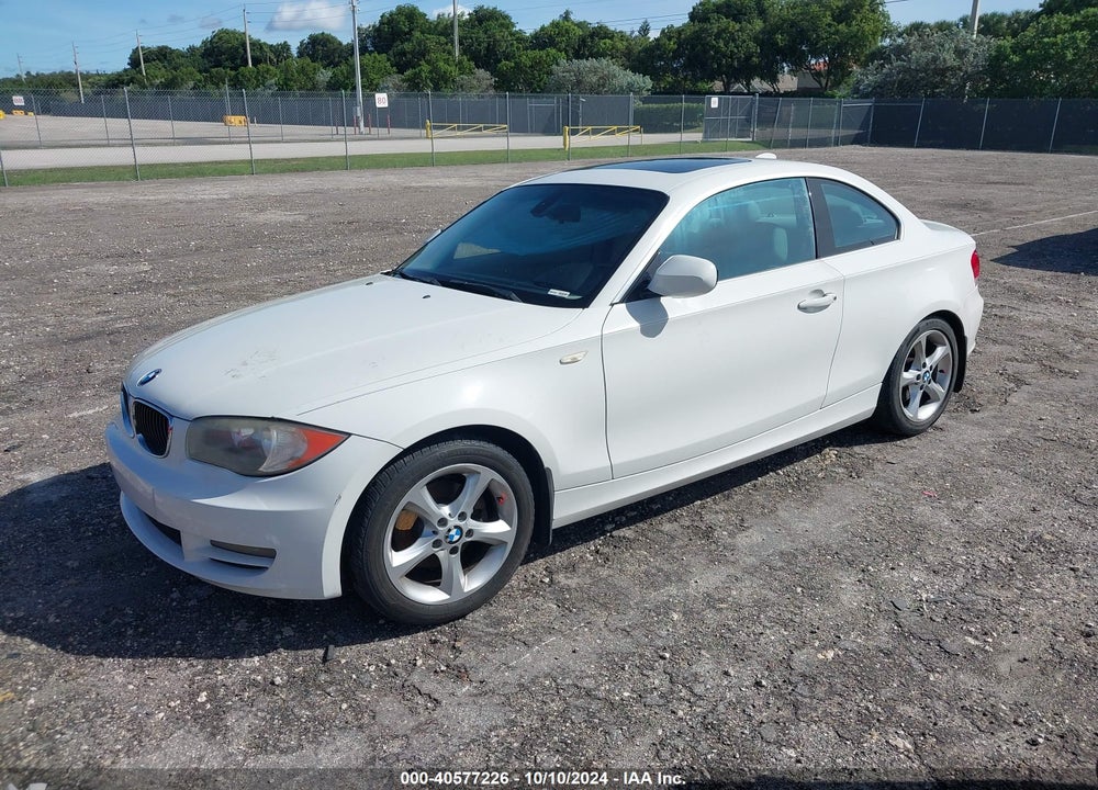 2010 BMW 128I VIN: WBAUP7C53AVK76834
