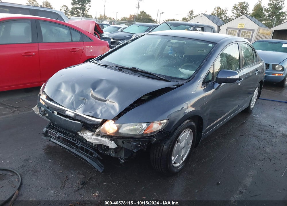 2010 HONDA CIVIC HYBRID VIN: JHMFA3F28AS005324