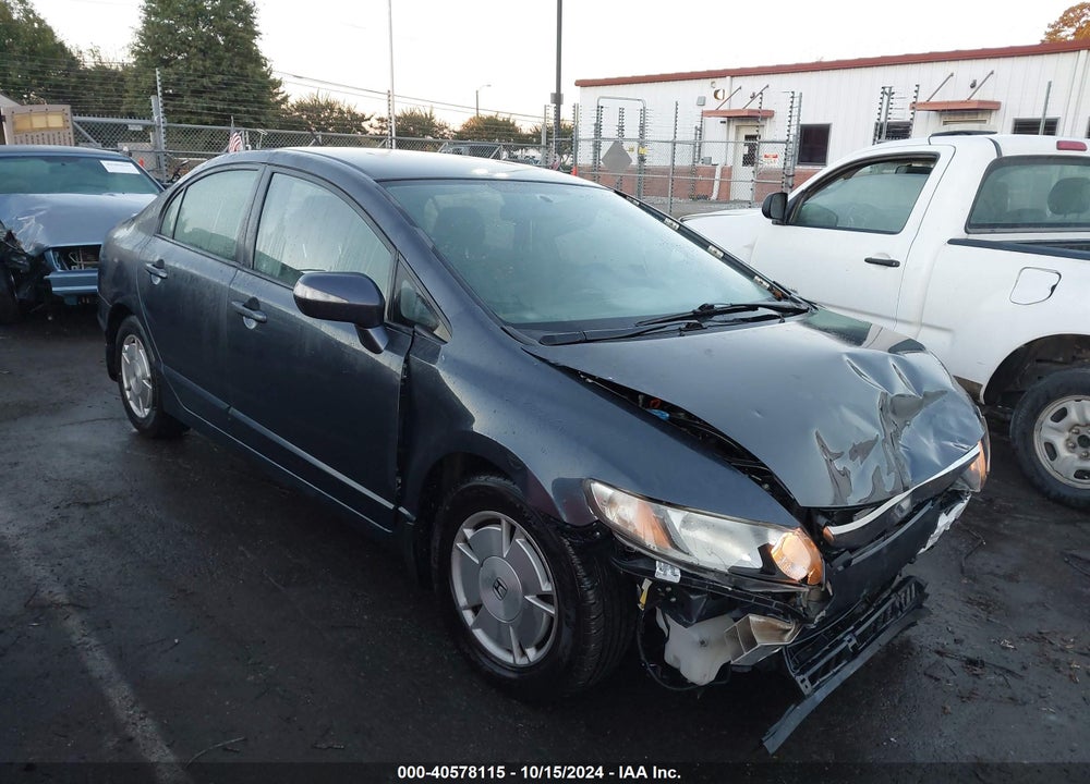 2010 HONDA CIVIC HYBRID VIN: JHMFA3F28AS005324