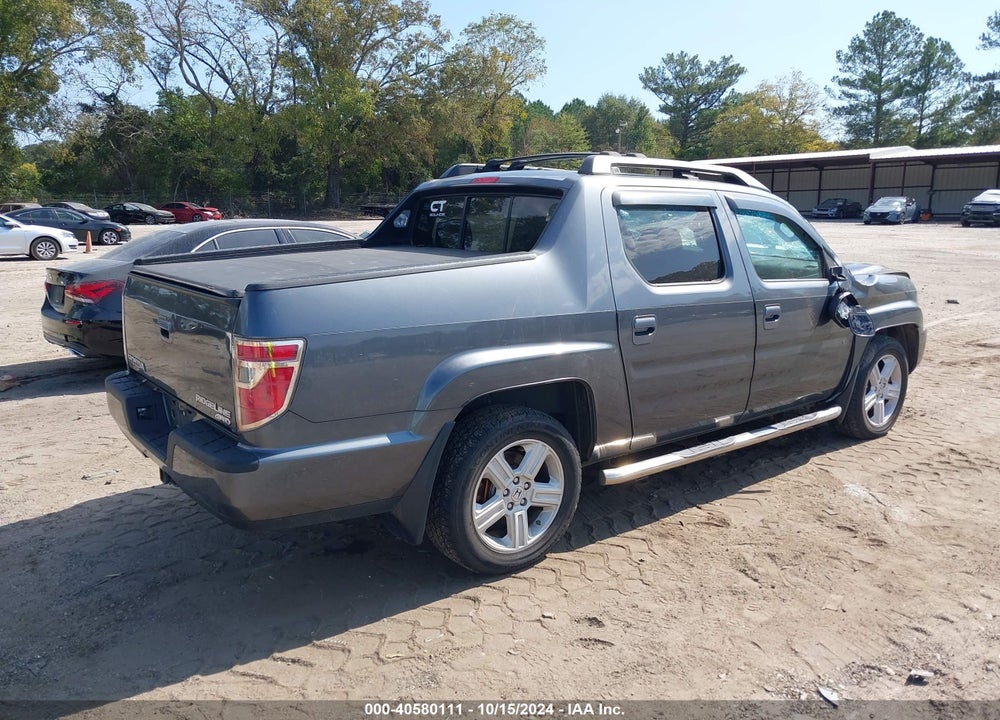 2012 HONDA RIDGELINE RTL VIN: 5FPYK1F54CB003051