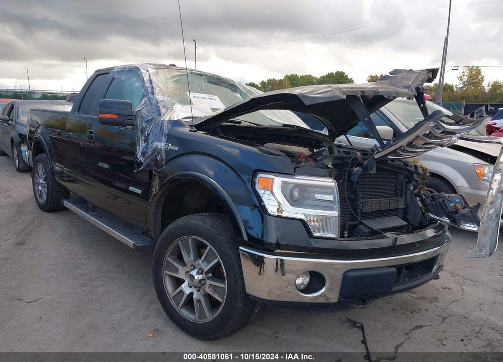 2014 FORD F-150 LARIAT VIN: 1FTFX1ET0EFC80702