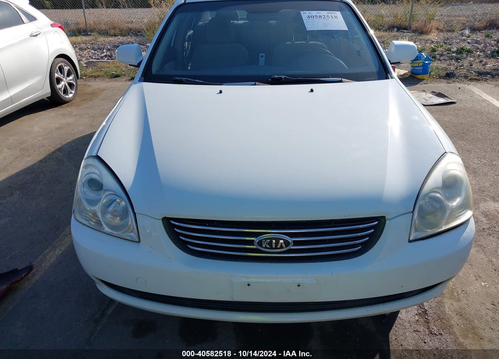 2008 KIA OPTIMA LX VIN: KNAGE123385250423