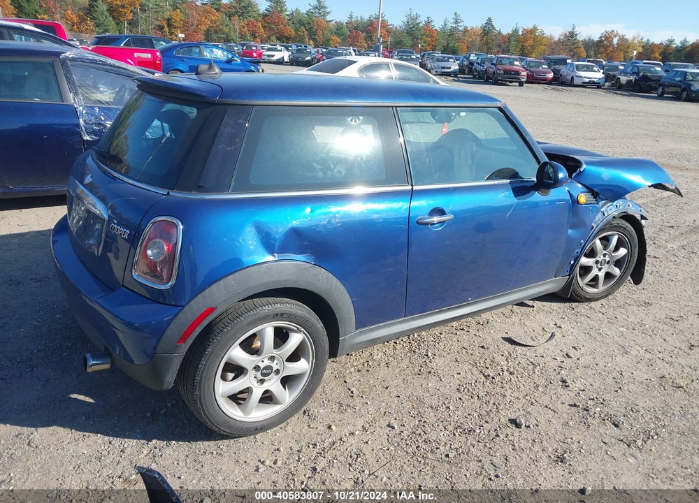 2007 MINI COOPER VIN: WMWMF33537TT53766