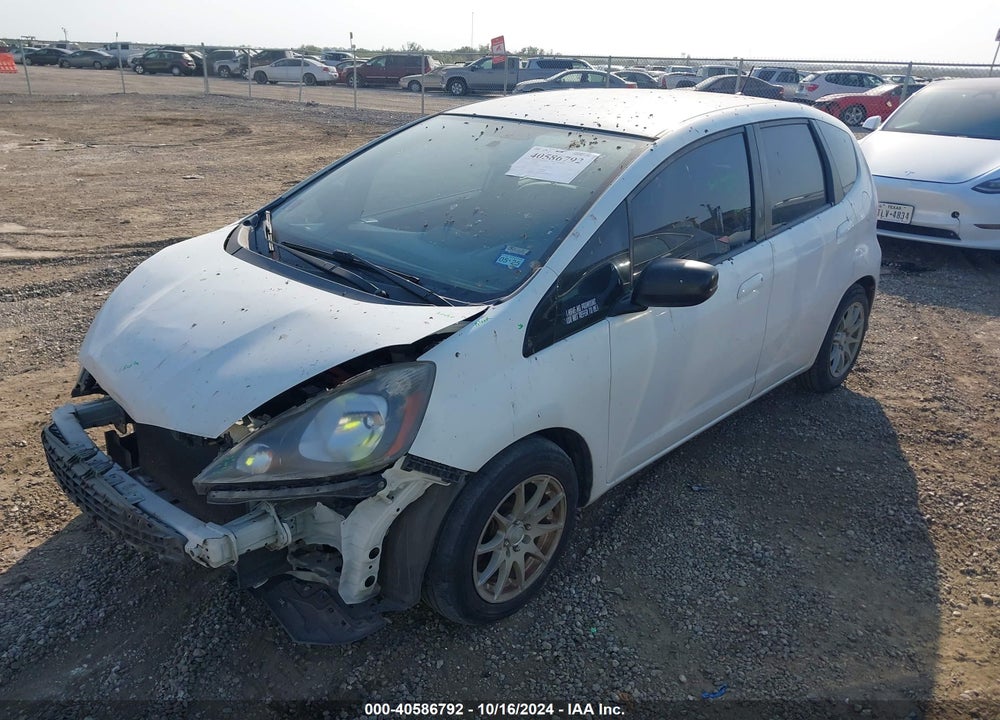 2010 HONDA FIT VIN: JHMGE8H27AS010582