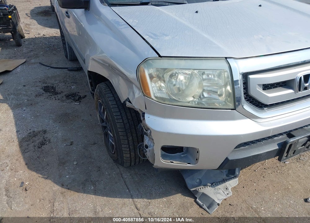 2011 HONDA PILOT LX VIN: 5FNYF3H23BB038142