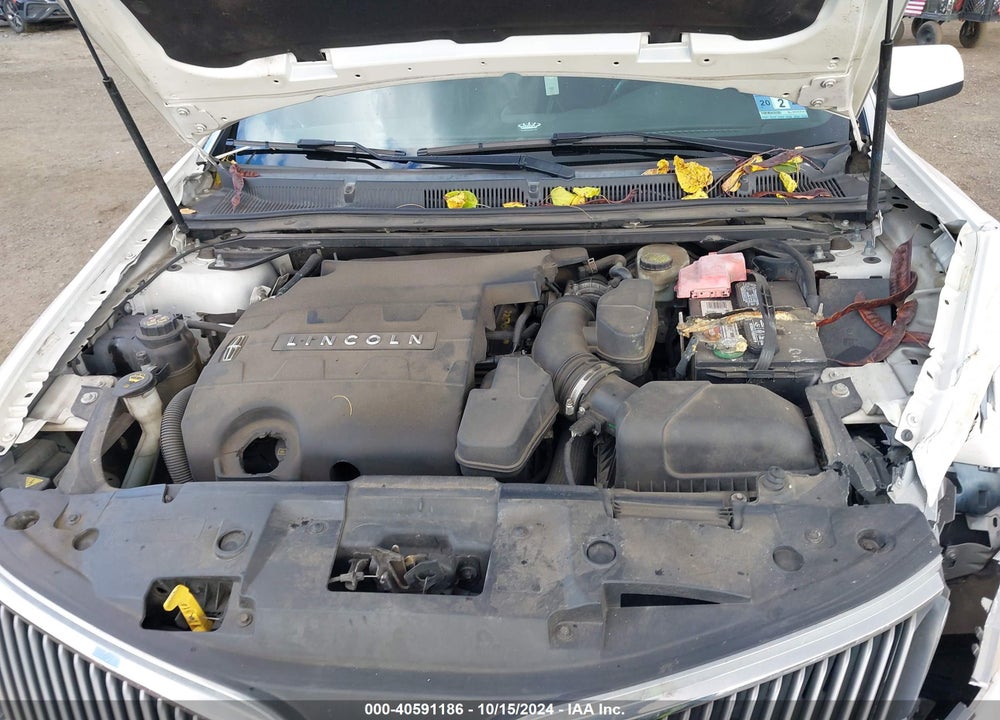 2014 LINCOLN MKS VIN: 1LNHL9EK8EG602437
