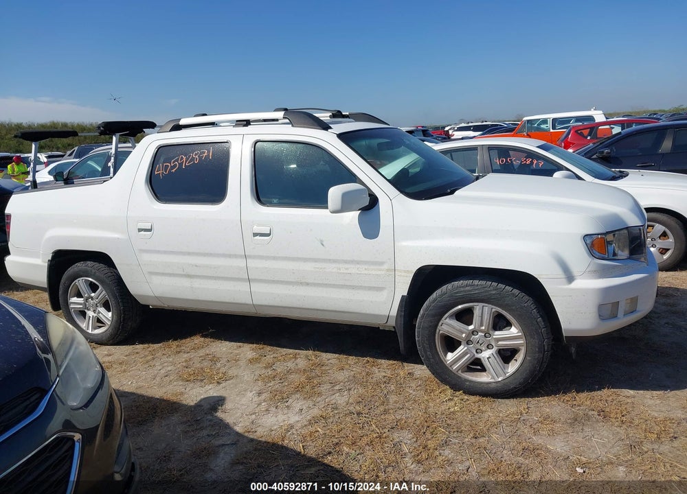 2012 HONDA RIDGELINE RTL VIN: 5FPYK1F58CB460574