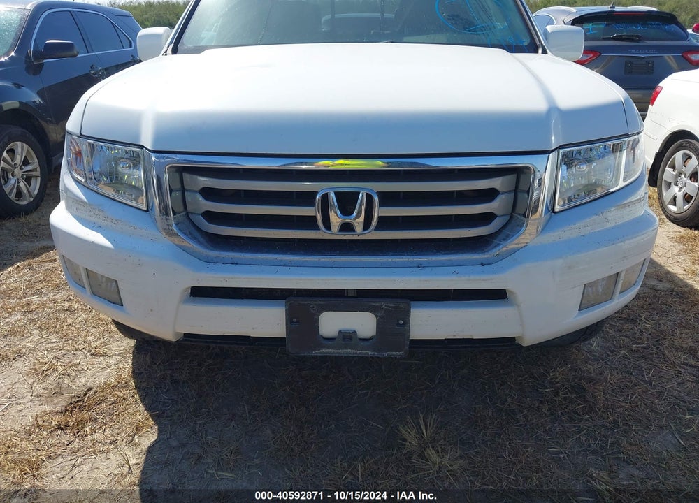 2012 HONDA RIDGELINE RTL VIN: 5FPYK1F58CB460574