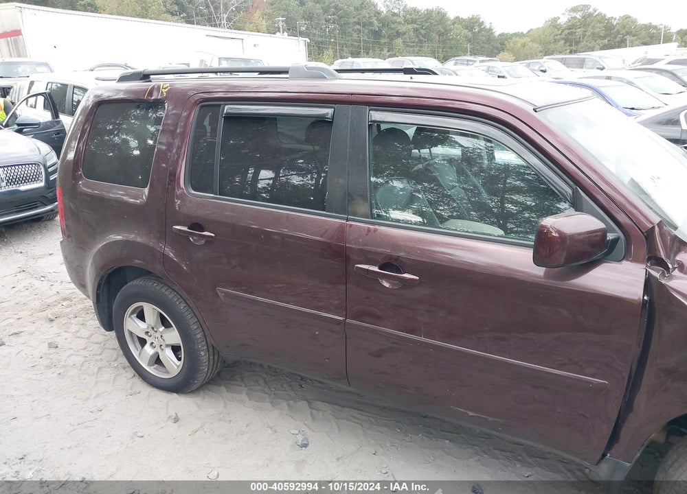 2011 HONDA PILOT EX-L VIN: 5FNYF3H57BB051924