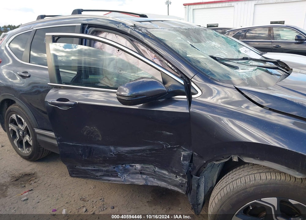 2017 HONDA CR-V TOURING VIN: 2HKRW1H95HH512561