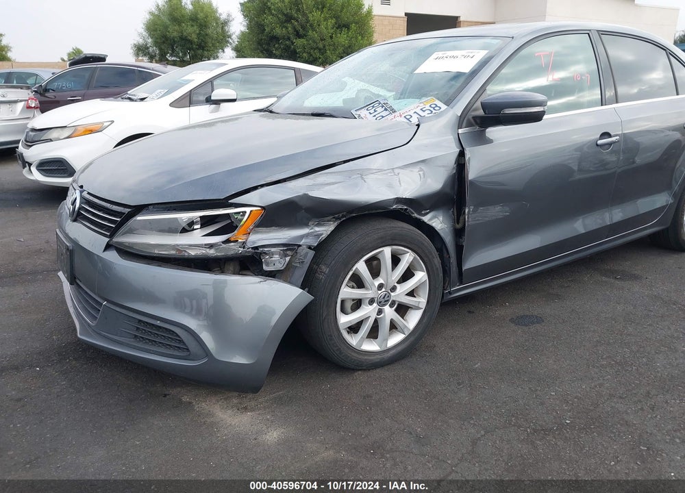 2014 VOLKSWAGEN JETTA 1.8T SE VIN: 3VWD17AJ2EM214049