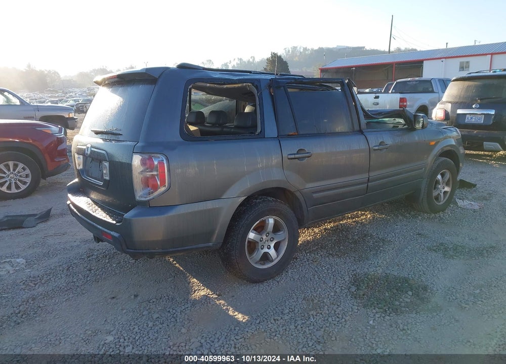 2007 HONDA PILOT EX-L VIN: 2HKYF186X7H524186