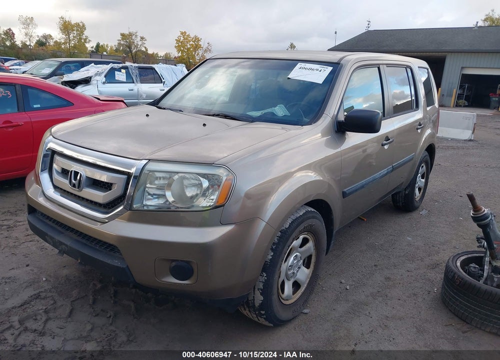 2011 HONDA PILOT LX VIN: 5FNYF4H27BB061896