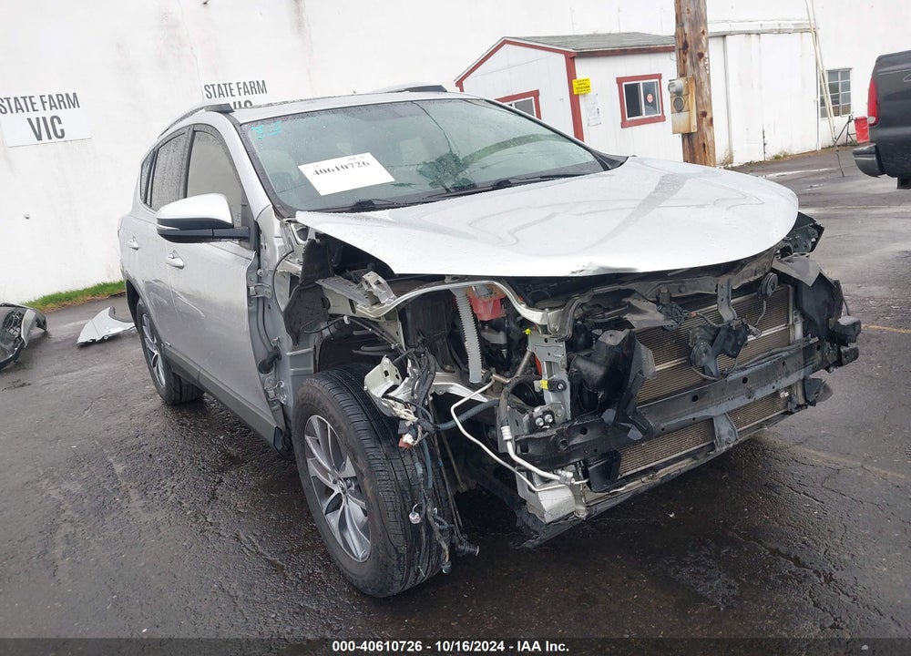 2016 TOYOTA RAV4 HYBRID XLE VIN: JTMRJREV2GD014756