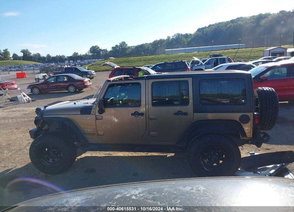 2015 JEEP WRANGLER UNLIMITED SAHARA VIN: 1C4BJWEG5FL614399