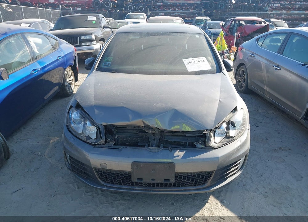 2013 VOLKSWAGEN GTI 4-DOOR VIN: WVWHV7AJ3DW084841