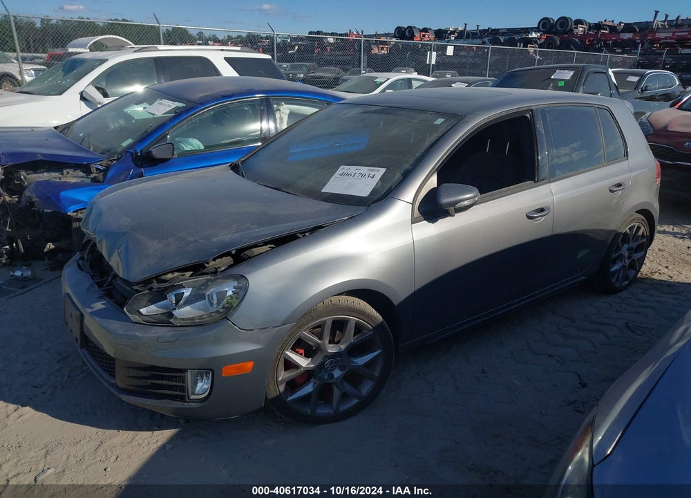 2013 VOLKSWAGEN GTI 4-DOOR VIN: WVWHV7AJ3DW084841