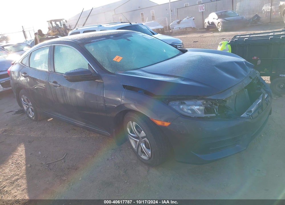 2018 HONDA CIVIC LX VIN: 19XFC2F52JE024227