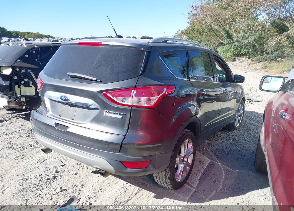 2016 FORD ESCAPE TITANIUM VIN: 1FMCU0JX1GUC18735