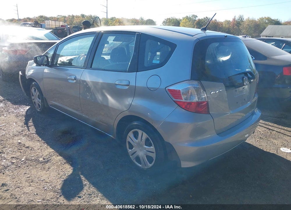 2009 HONDA FIT VIN: JHMGE88299S064879