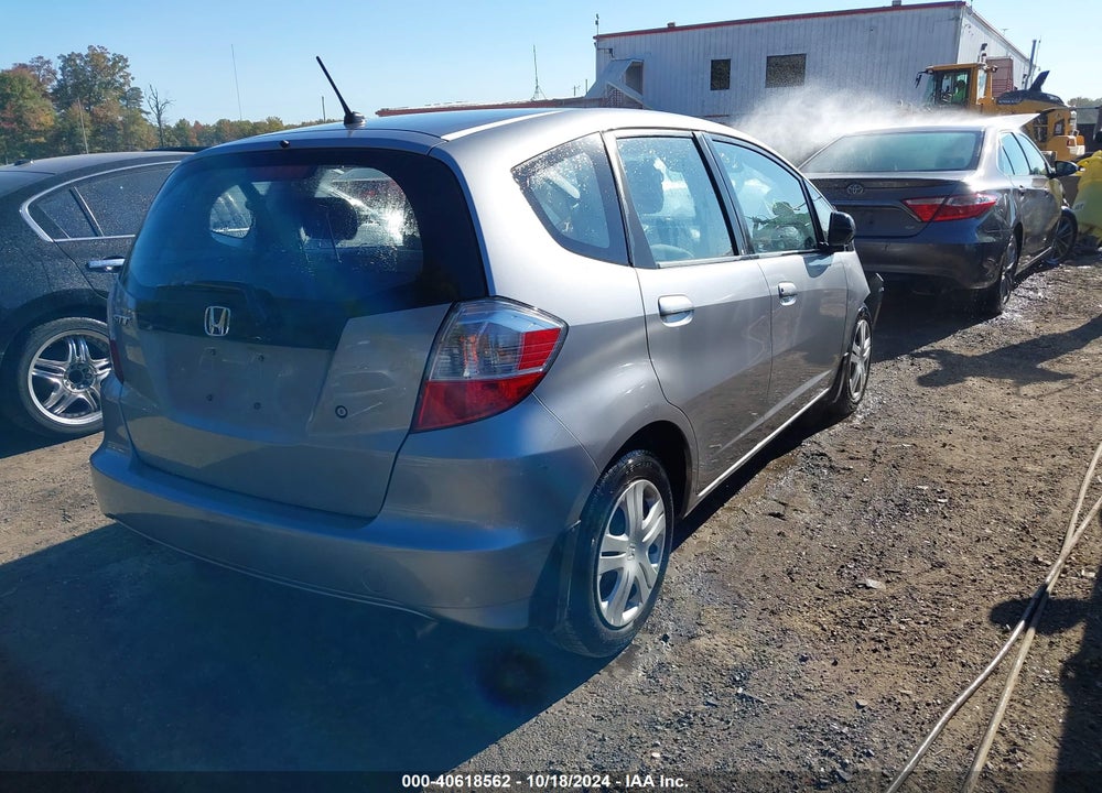 2009 HONDA FIT VIN: JHMGE88299S064879