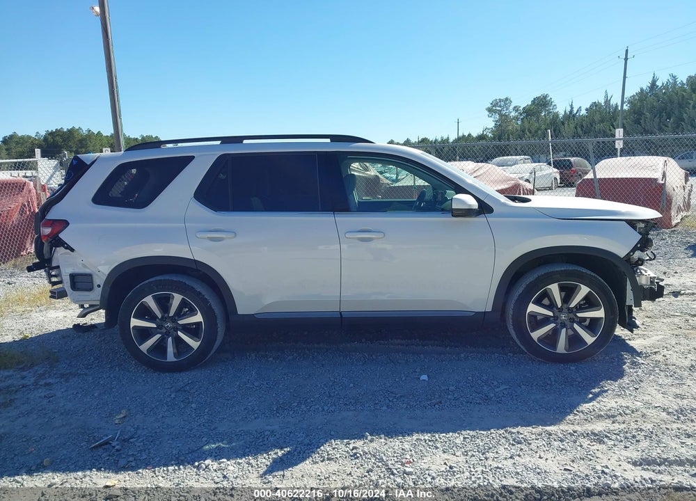 2023 HONDA PILOT 2WD TOURING VIN: 5FNYG2H70PB014844