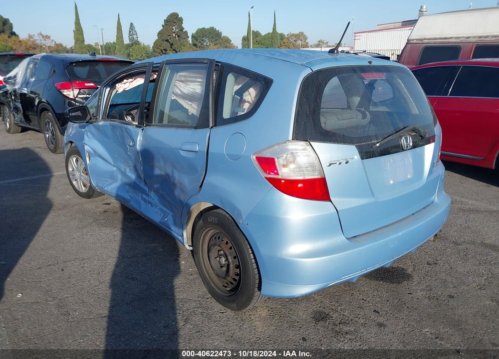 2009 HONDA FIT VIN: JHMGE88209S061059