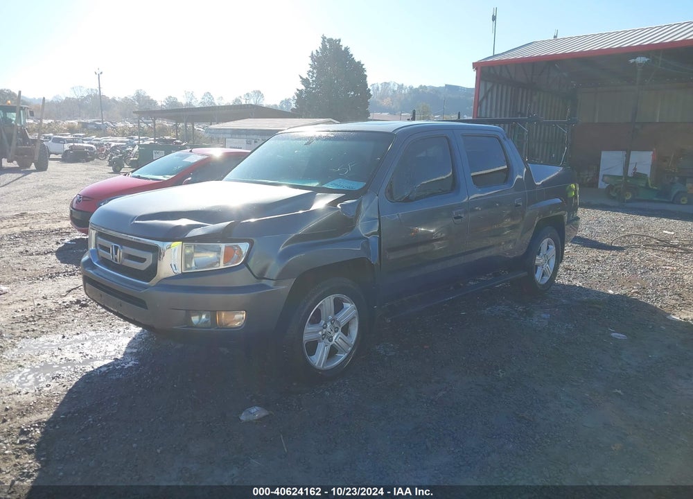 2010 HONDA RIDGELINE RTL VIN: 5FPYK1F51AB003845